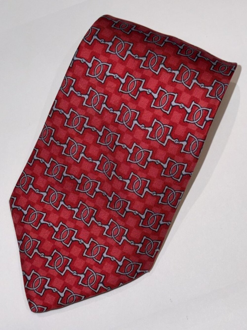 HERMES Red Blue Horsebit Pattern Print Silk Tie